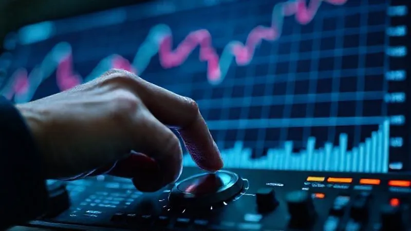 Photorealistic professional photography of a financial graph showing both upward and downward trends, with a small hand adjusting a dial on a control panel in the foreground, cinematic lighting, sharp focus on the hand and the dial, depth of field blurring the graph, 8K hyper-detailed, shot on a high-end DSLR, symbolizing proactive management amidst market volatility.